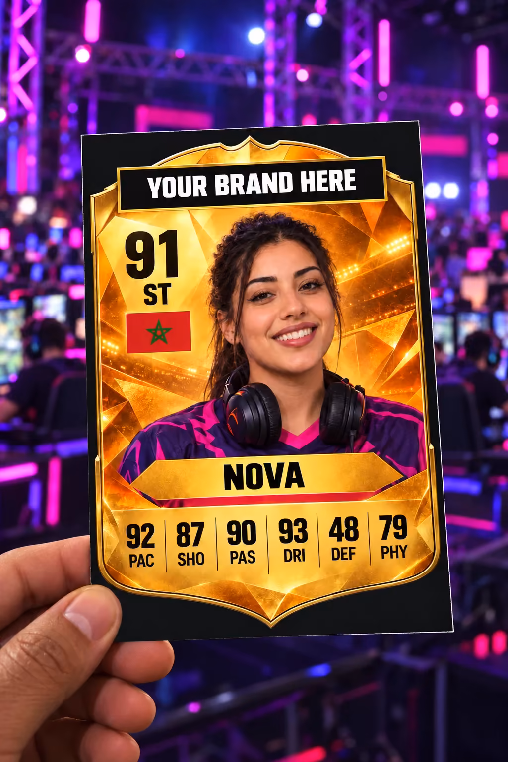 A hand holds a gold player card for Nova, rated 91, with her smiling portrait and “Your brand here” at the top, in front of an esports stage