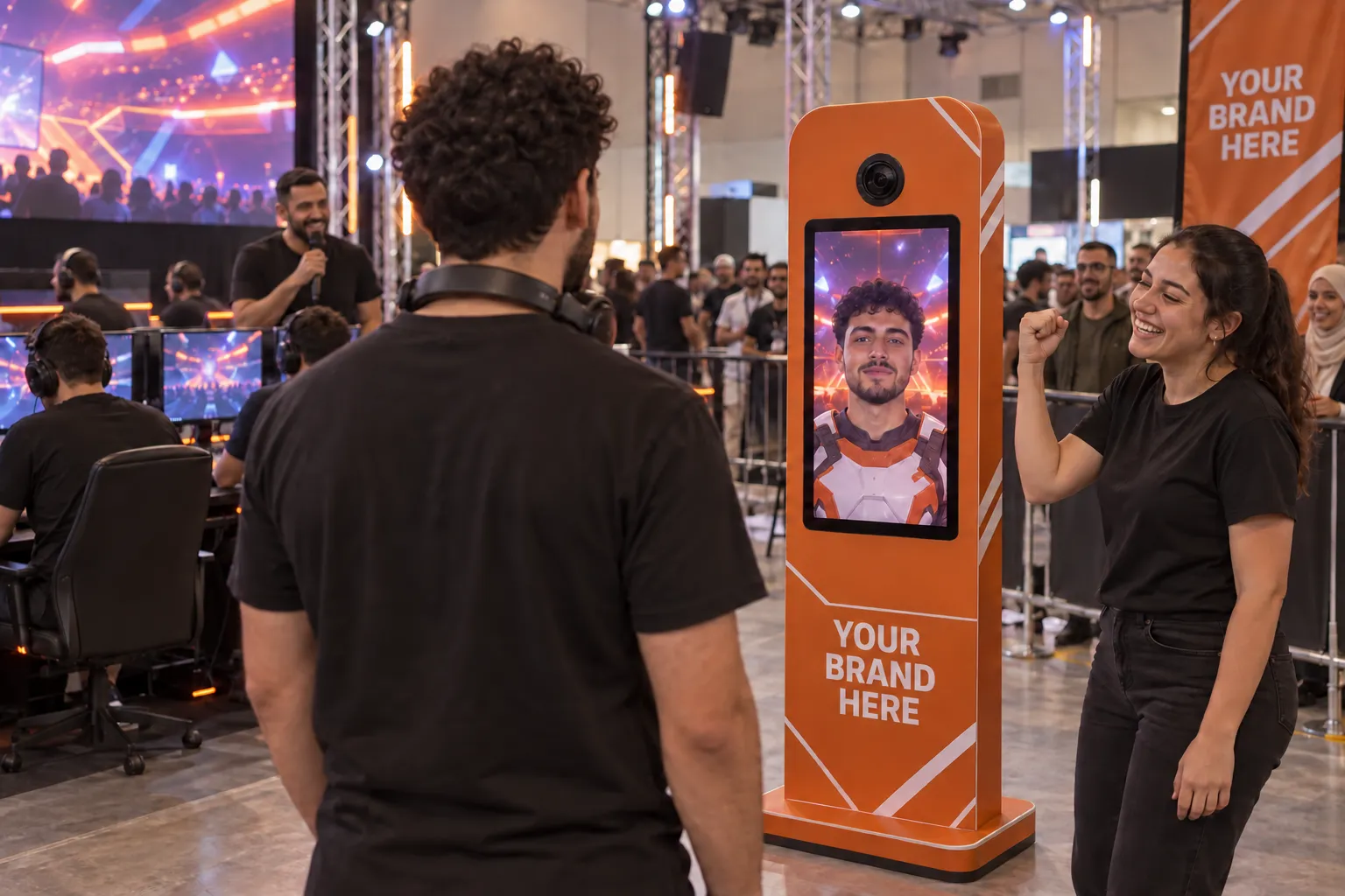 At an esports tournament, a player sees his avatar on a booth in your brand colours as his teammate raises a fist